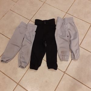 2 pairs of 2xs baseball pants 1 pair of xs